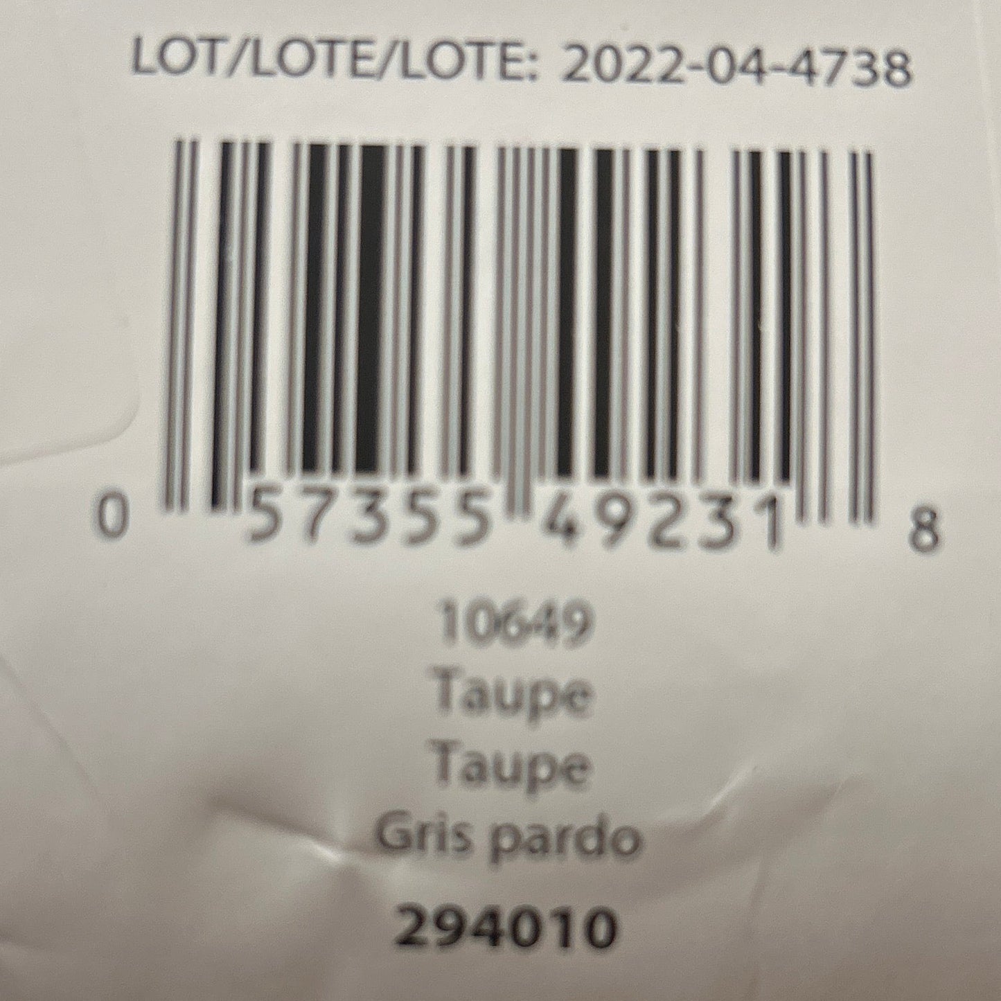 Product label with barcode and text on a white background