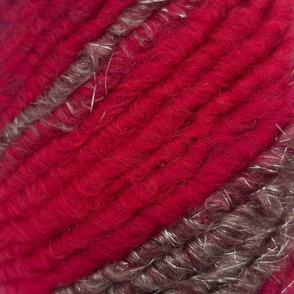 Red and brown skein of yarn on a white background