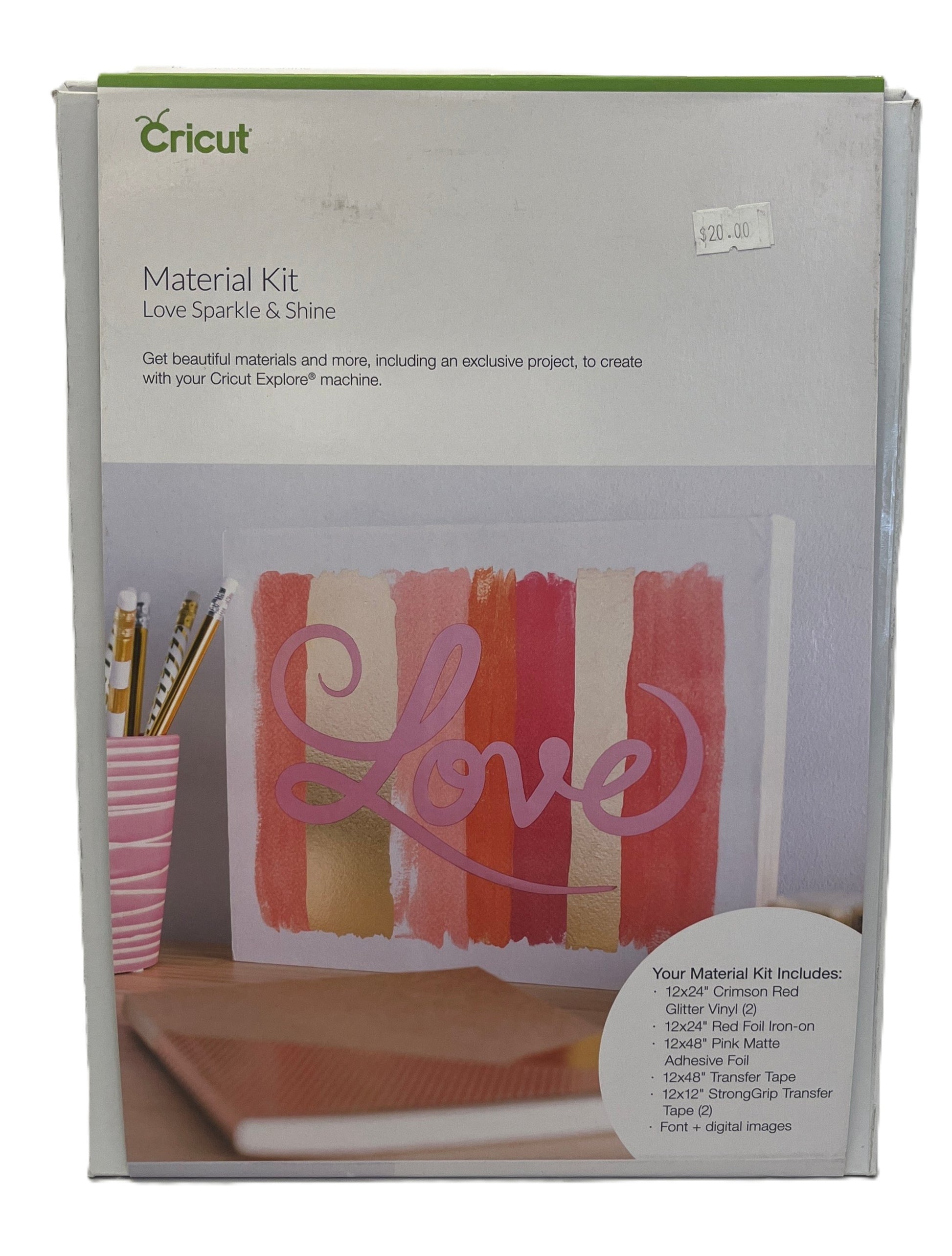 Cricut Material Kit packaging with 'Love' design on a white background