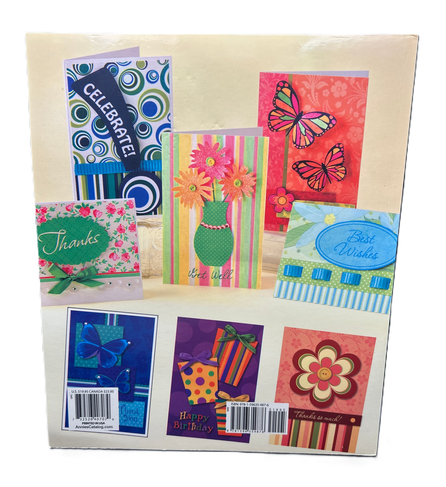 Assorted colorful greeting cards in a packaging sleeve with visible barcodes.