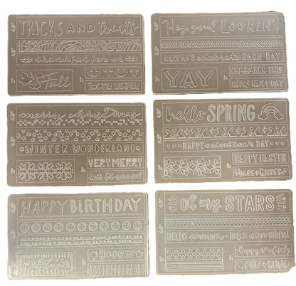 Set of decorative rectangular tiles with various text and patterns on a beige background