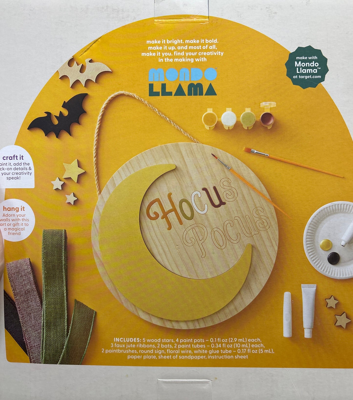 Wooden toy packaging with a llama design on a yellow background