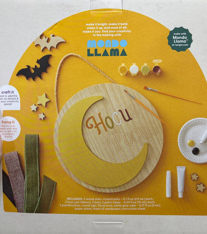 Wooden toy packaging with a llama design on a yellow background