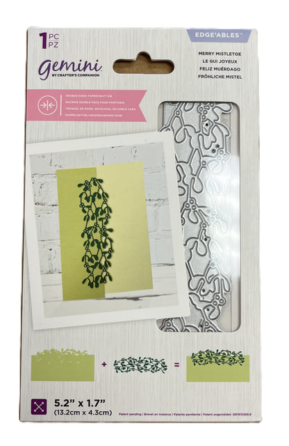 Gemini craft die set packaging with mistletoe design on a white background