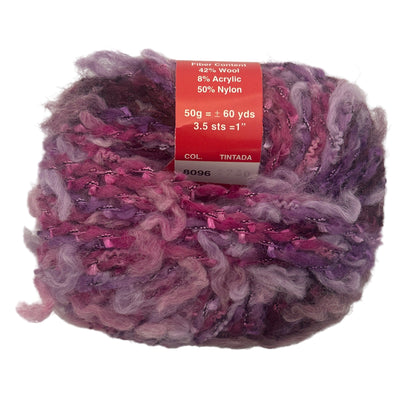 Ball of multicolored yarn with a label on a white background