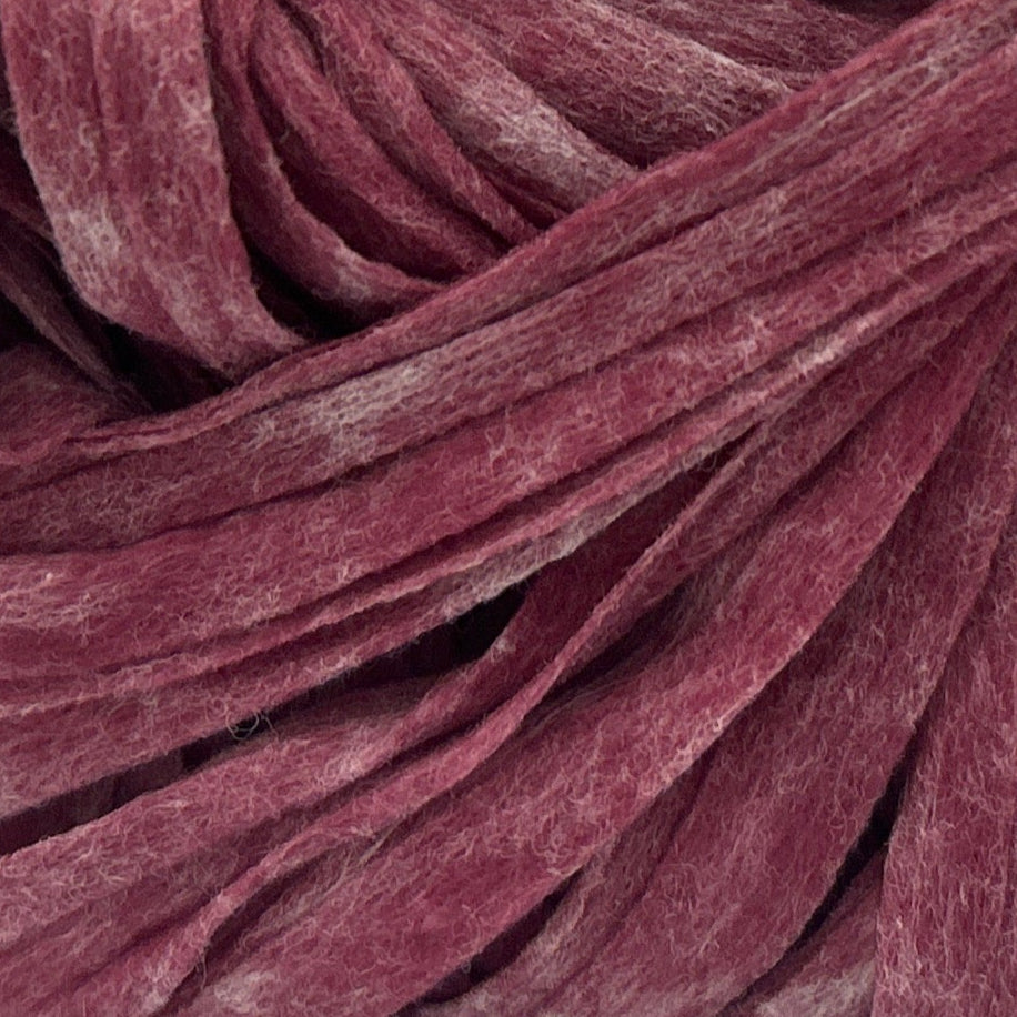Close-up of burgundy yarn strands