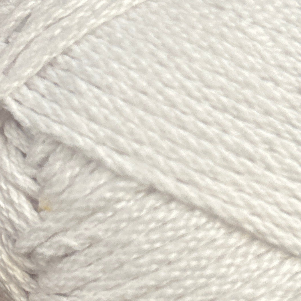 Close-up of a ball of white yarn