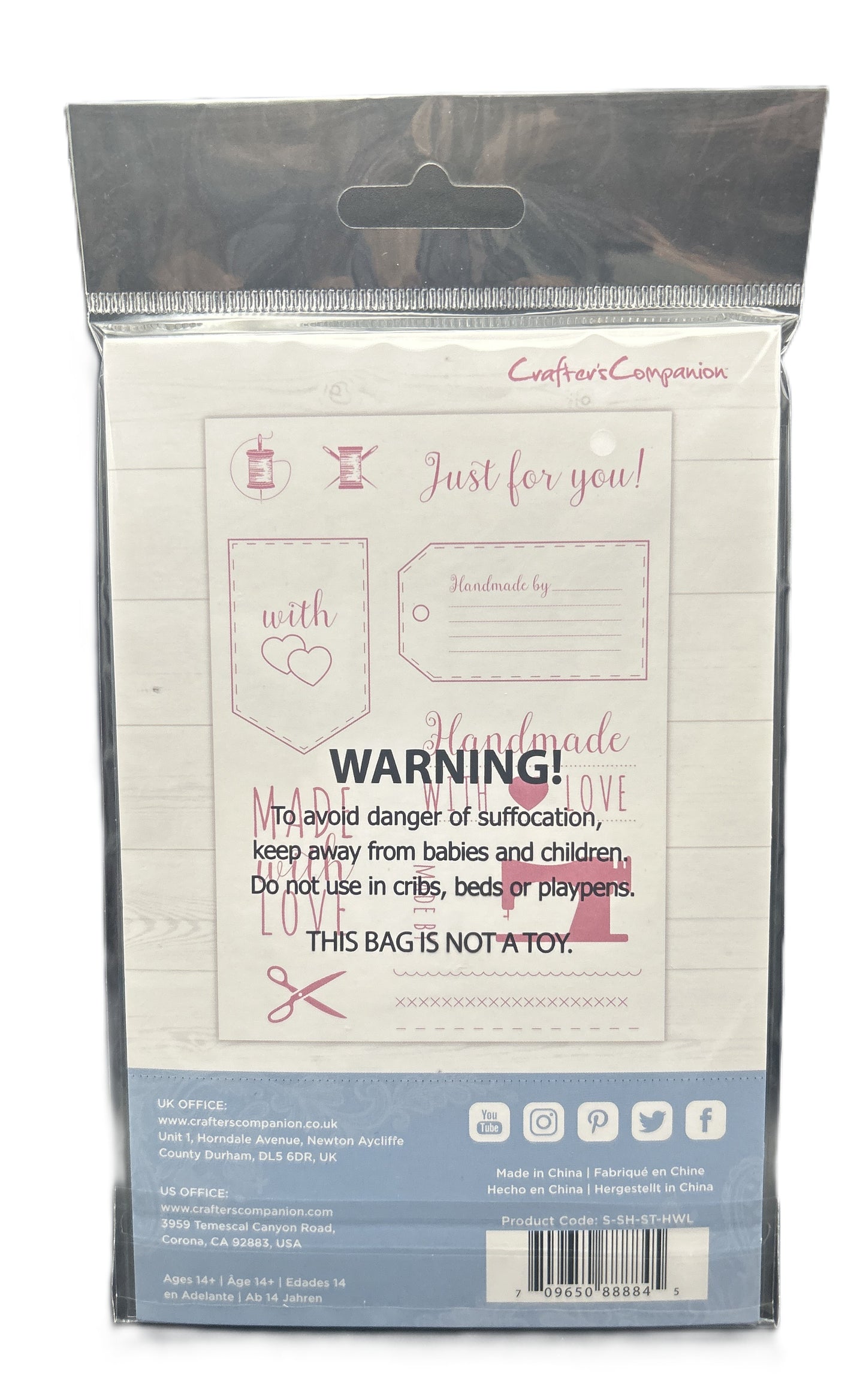 Package of cardstock with warning label and branding on a white background