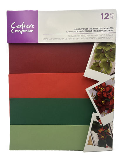 Pack of craft paper with red, green, and brown colors, featuring 'Crafters Companion' branding.