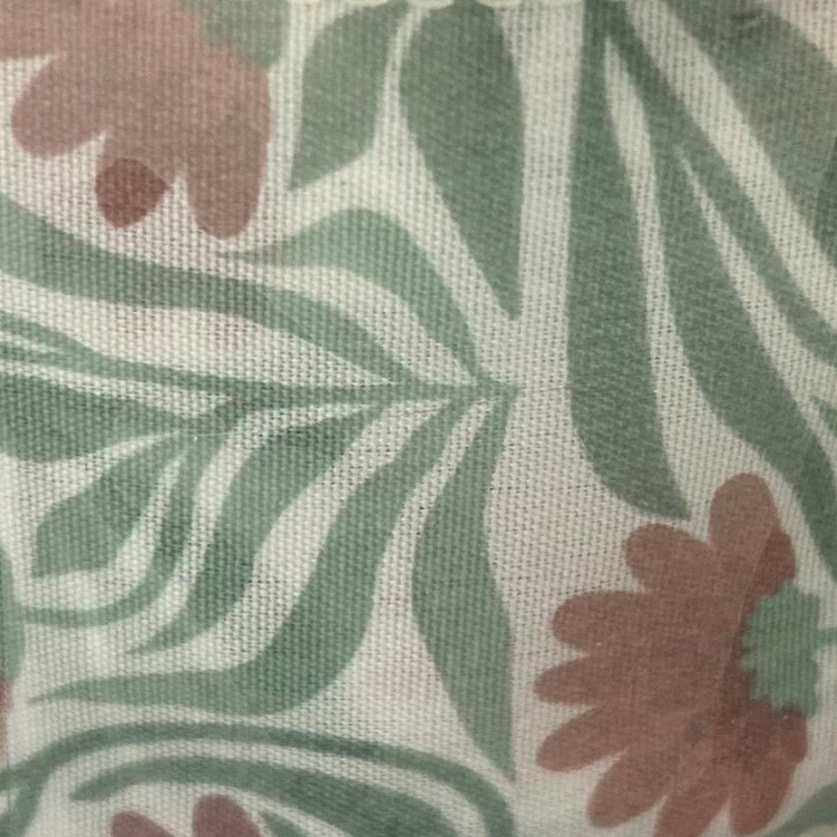 Close-up of fabric with floral and leaf pattern