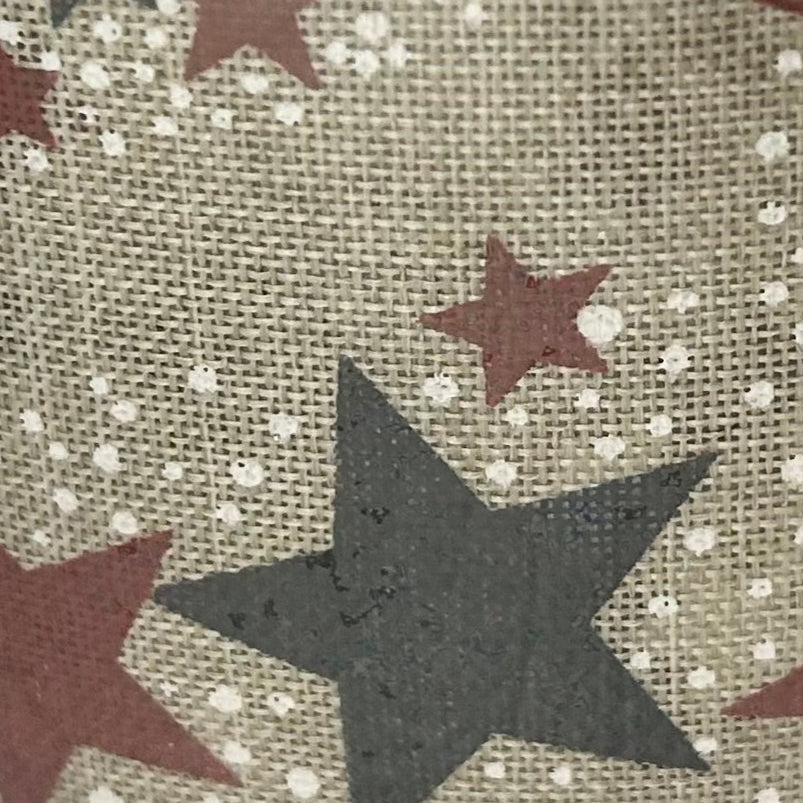 Fabric with star pattern on a beige background