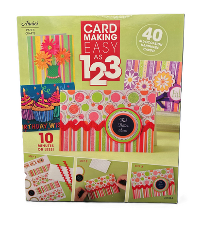 Card making kit packaging with colorful designs and text on a green background