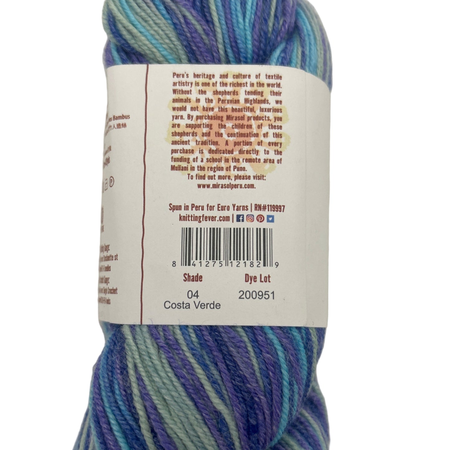 Multicolored skein of yarn with a label on a white background