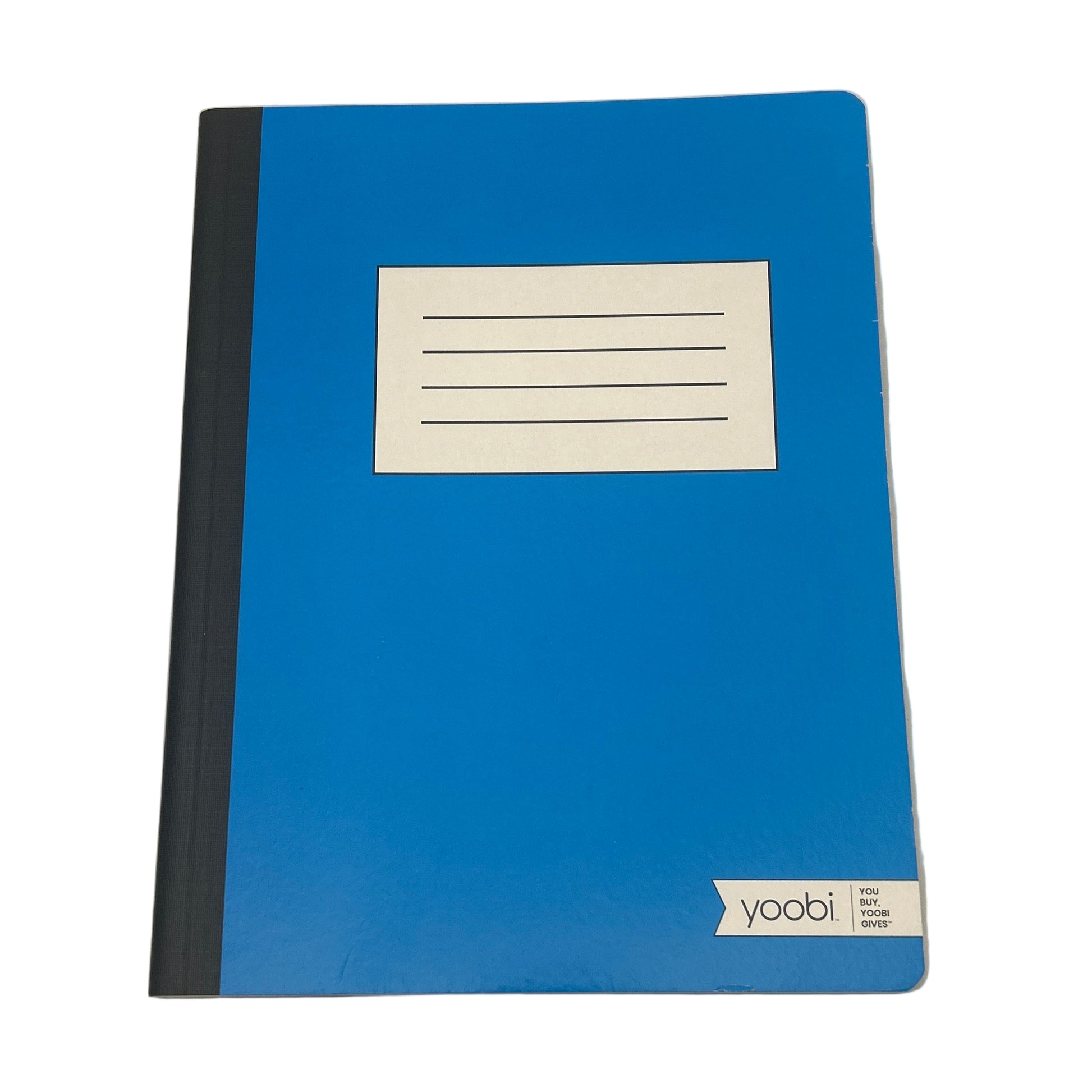 Blue electronic device with a white label on a beige background