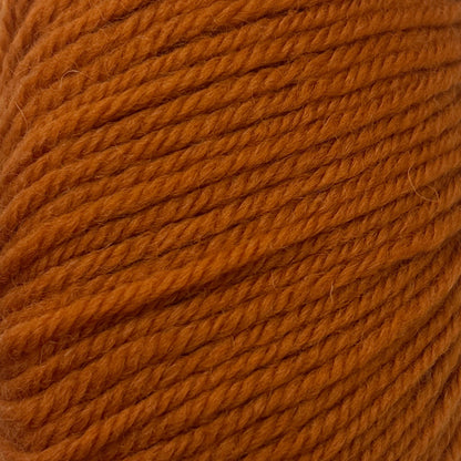Close-up of a ball of orange yarn