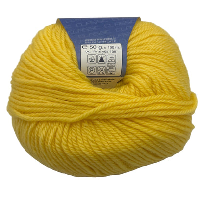 Yellow ball of yarn with a label on a white background