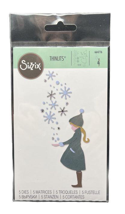 Sizzix Thinlits die set packaging with a girl and snowflakes design.