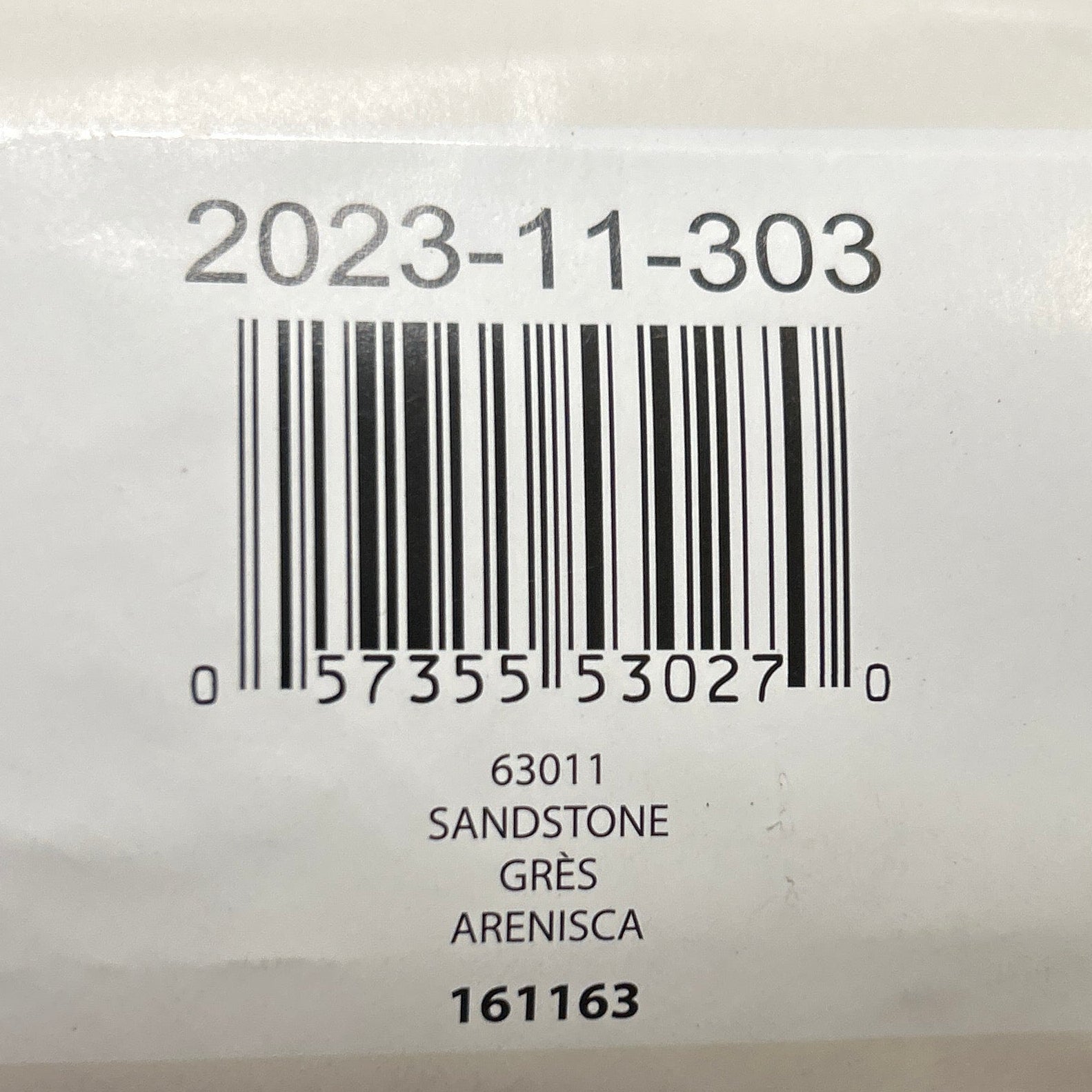 Yarn ball with a label showing a barcode and text