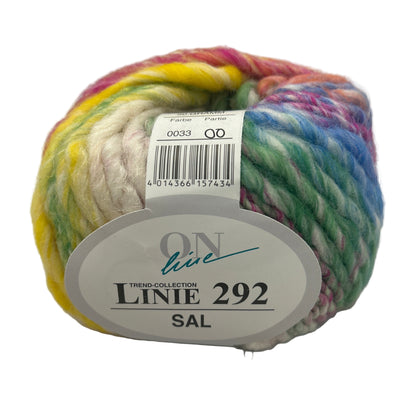 Multicolored yarn ball with a label on a white background
