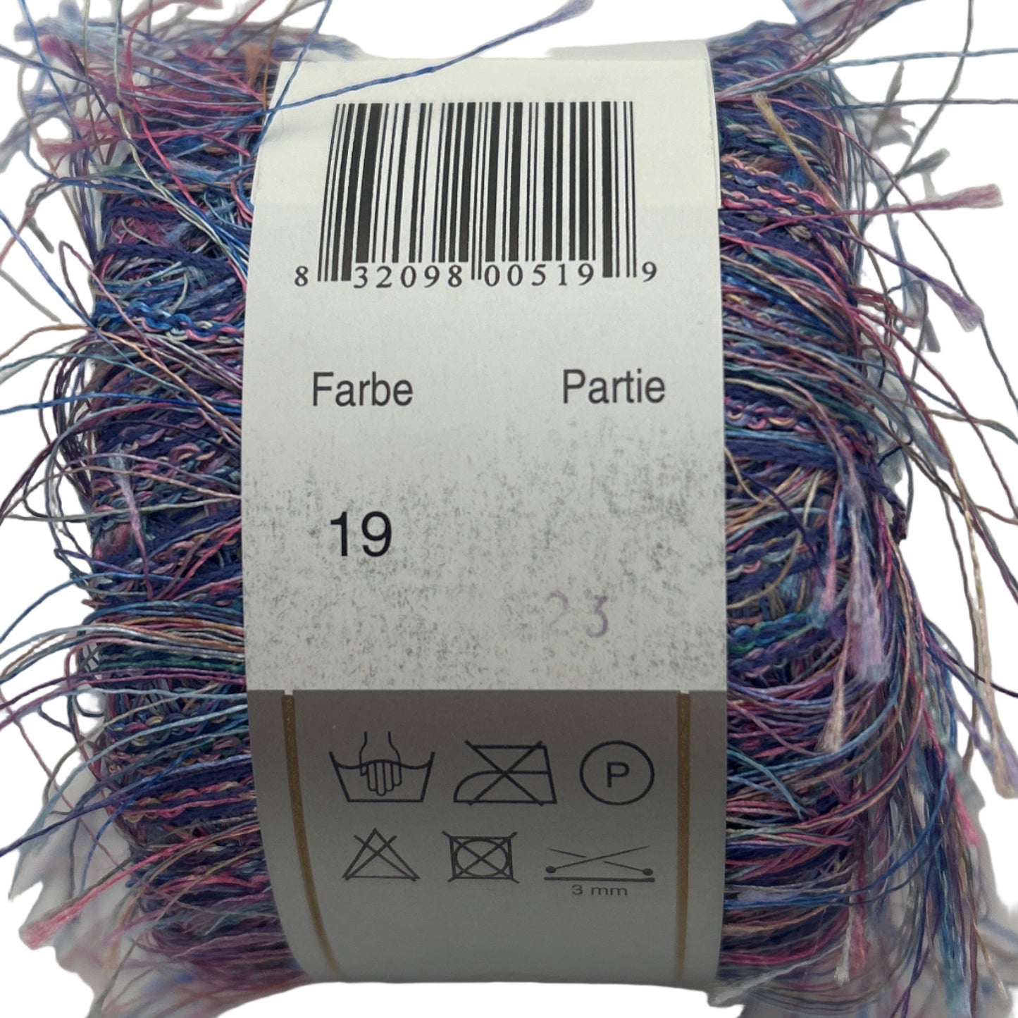 Multicolored yarn ball with a label showing text and symbols