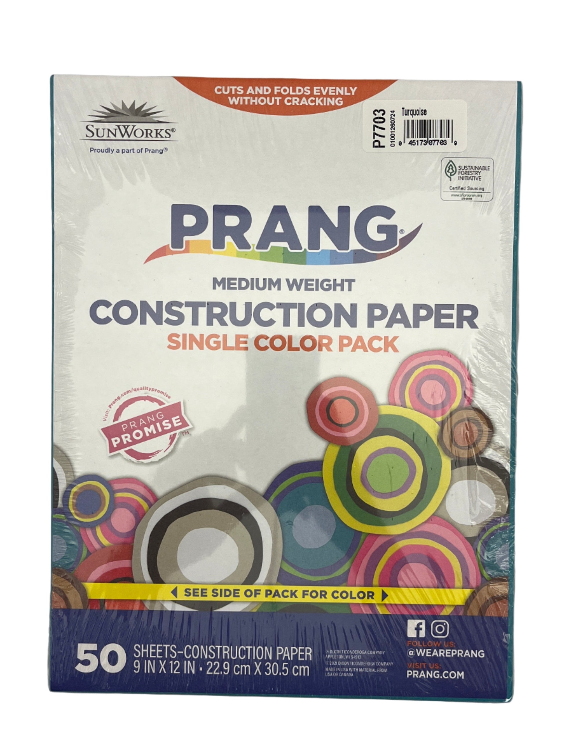 Box of Prang construction paper on a gray background