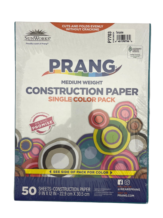 Box of Prang construction paper on a gray background