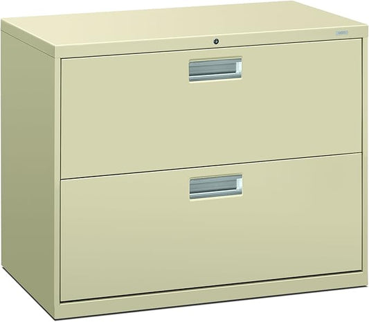 Beige two-drawer filing cabinet with metallic handles on a white background
