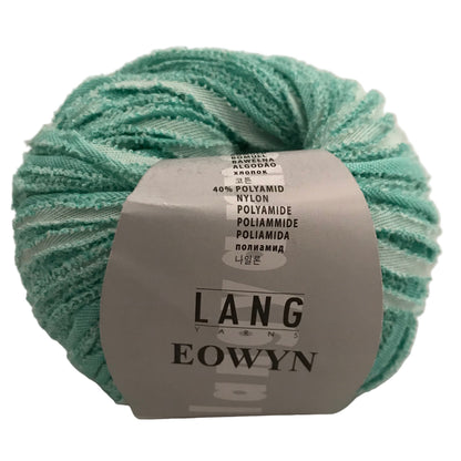 Ball of yarn with a label on a white background