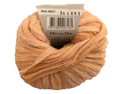 Ball of yarn with a label on a white background