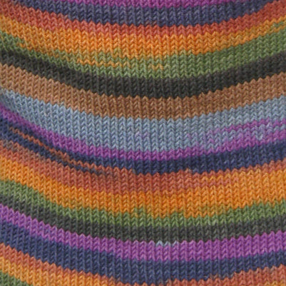Close-up of multicolored striped fabric with a patterned texture.