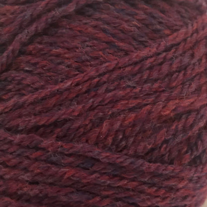 Close-up of a ball of dark red yarn