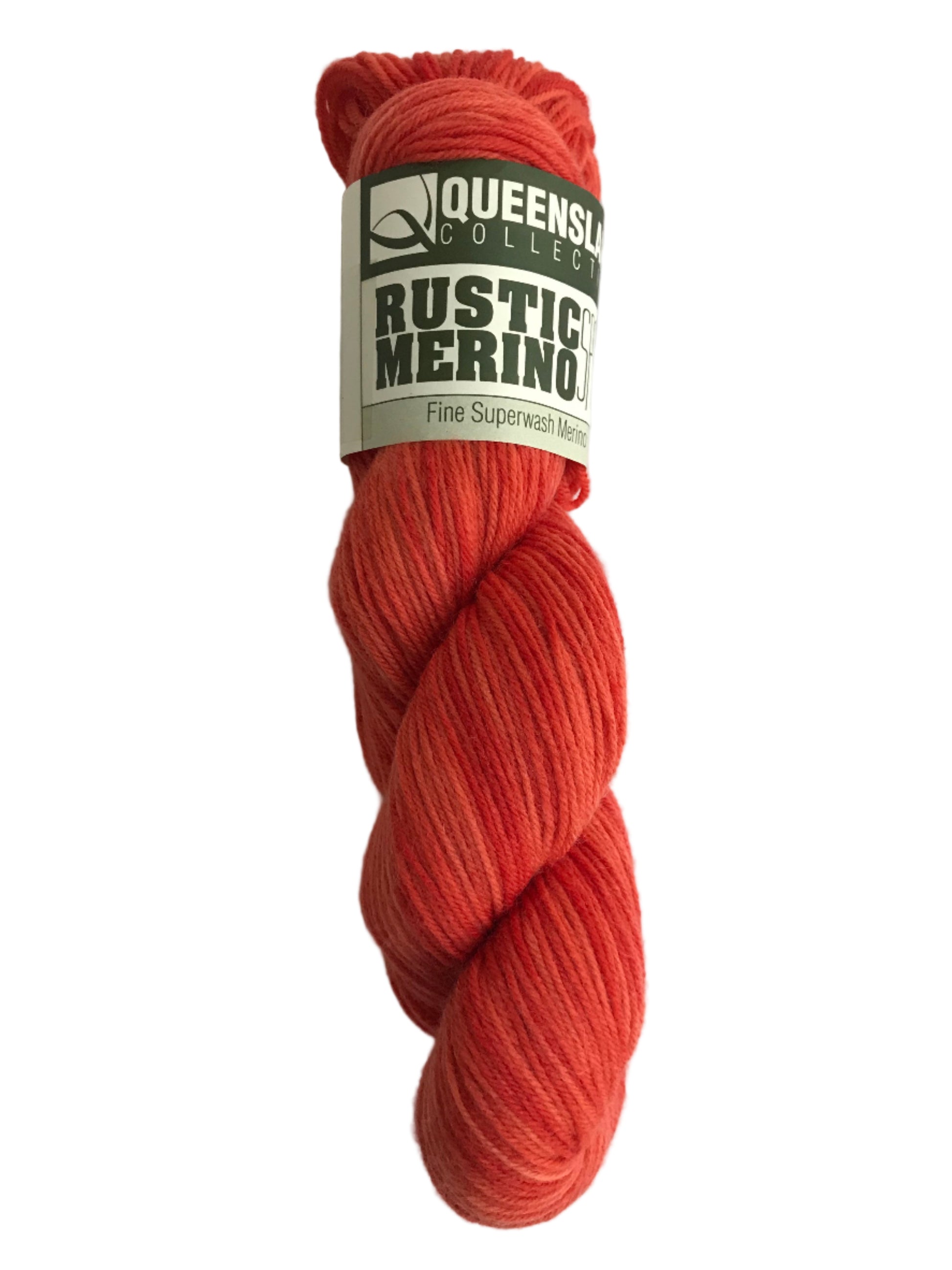 Red skein of yarn with a label on a white background