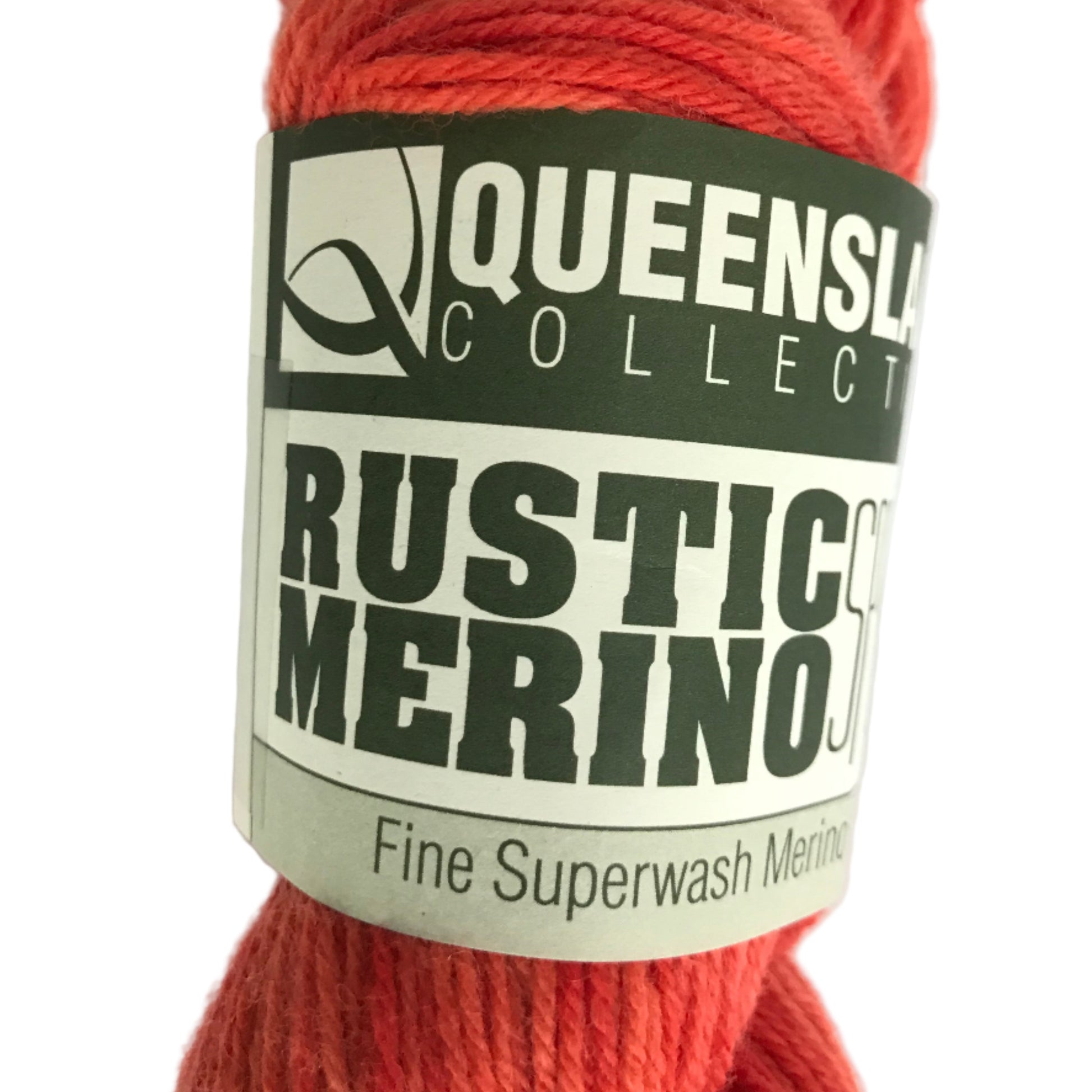 Red skein of yarn with a label on a white background