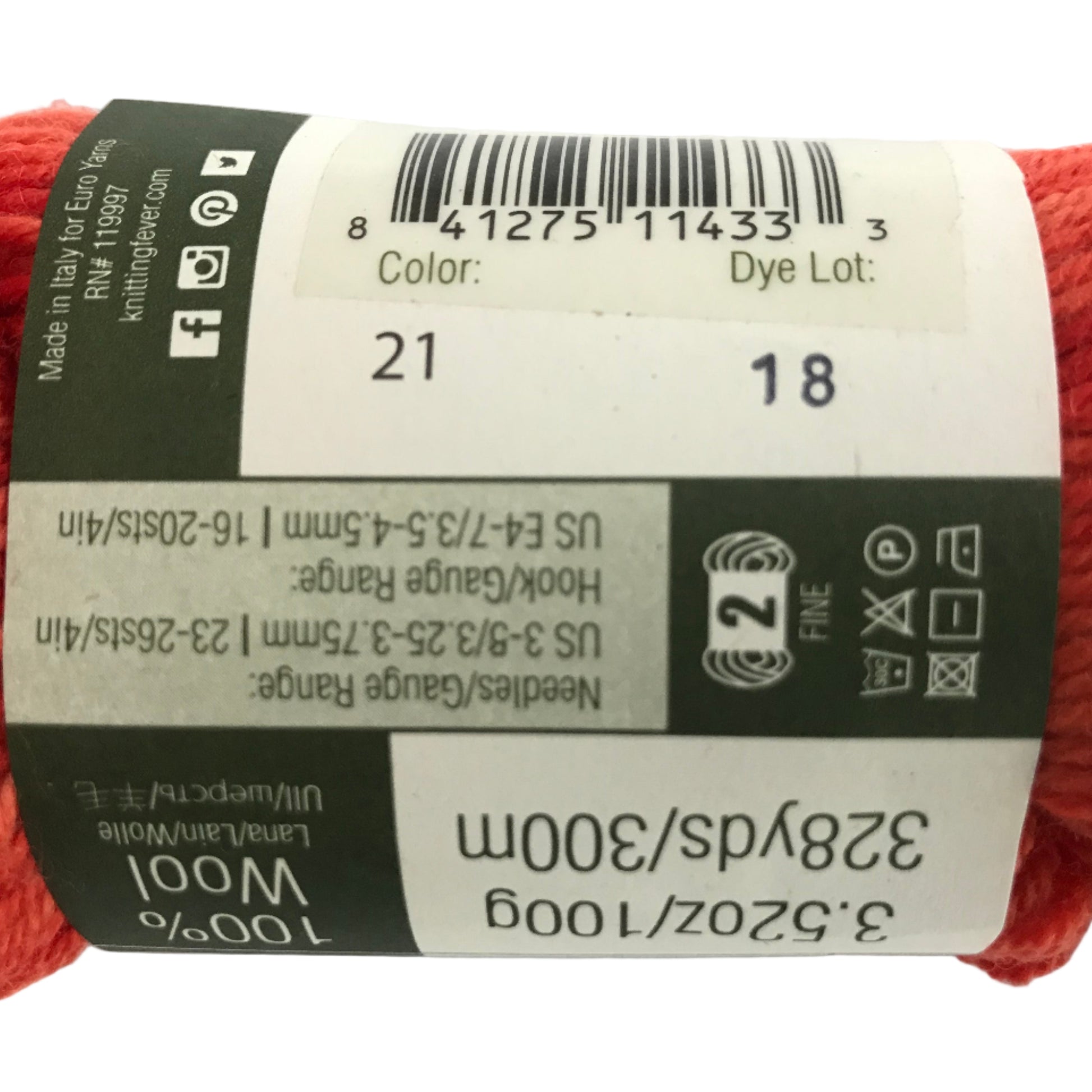 Red skein of yarn with a label on a white background