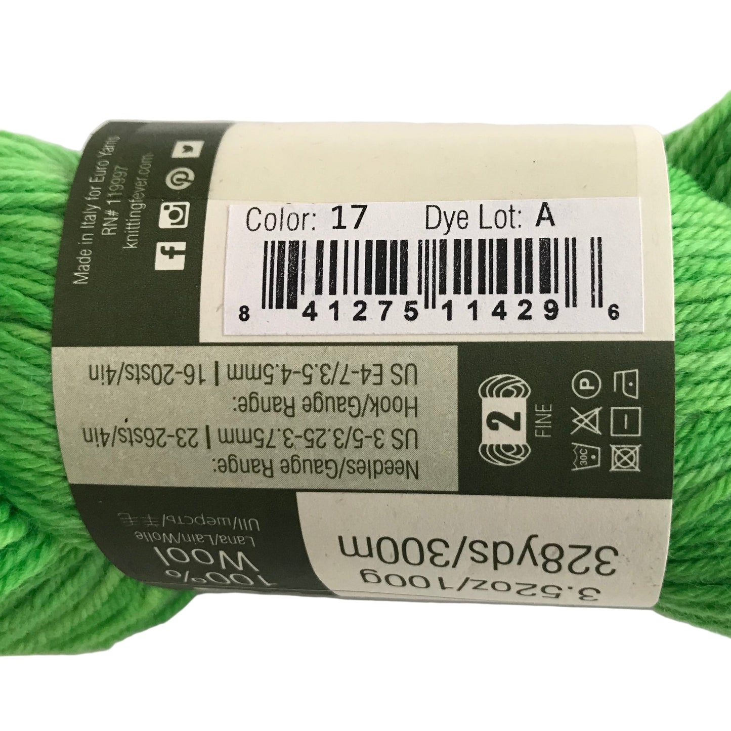 Green skein of yarn with a label on a white background