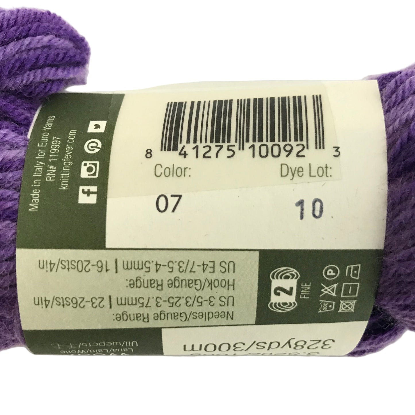 Purple yarn with a label on a white background