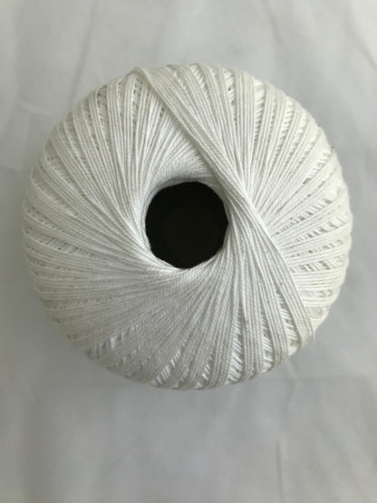 White skein of yarn on a white background