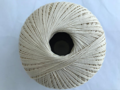 Ball of yarn on a light blue background