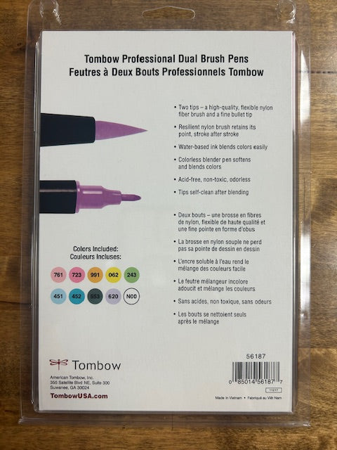 An image of a box of Tombow Professional Dual Brush Pens. These pens feature a flexible nylon brush tip and a fine bullet tip. The water-based ink is blendable, acid-free, non-toxic, and odorless. The tips self-clean after blending