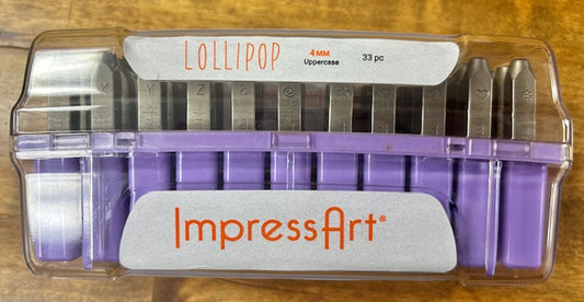 A purple case containing a set of ImpressArt Lollipop Uppercase Letters 4mm Metal Stamps. 