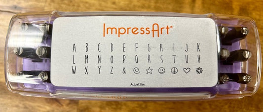 A purple case containing a set of ImpressArt Lollipop Uppercase Letters 4mm Metal Stamps. 