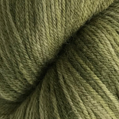 Close-up of green yarn with a textured surface