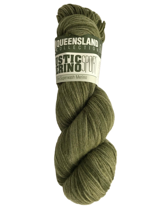 Green skein of yarn with a label on a white background
