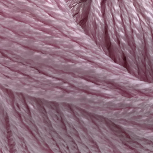 Pink yarn ball with a label on a white background