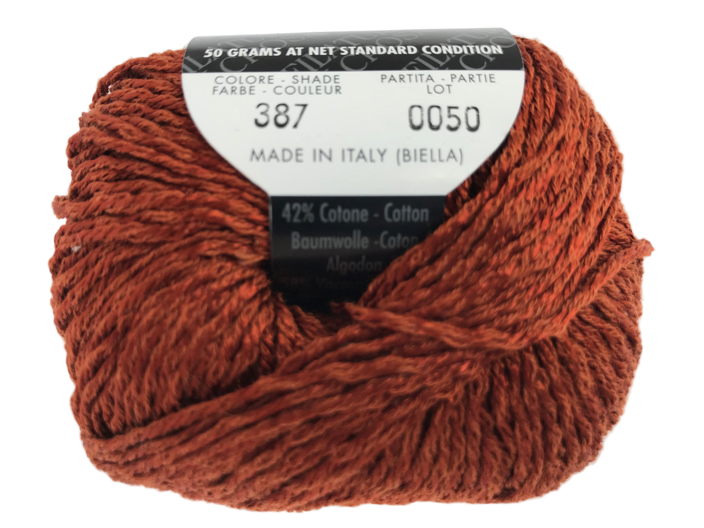 Ball of red yarn with a label on a white background