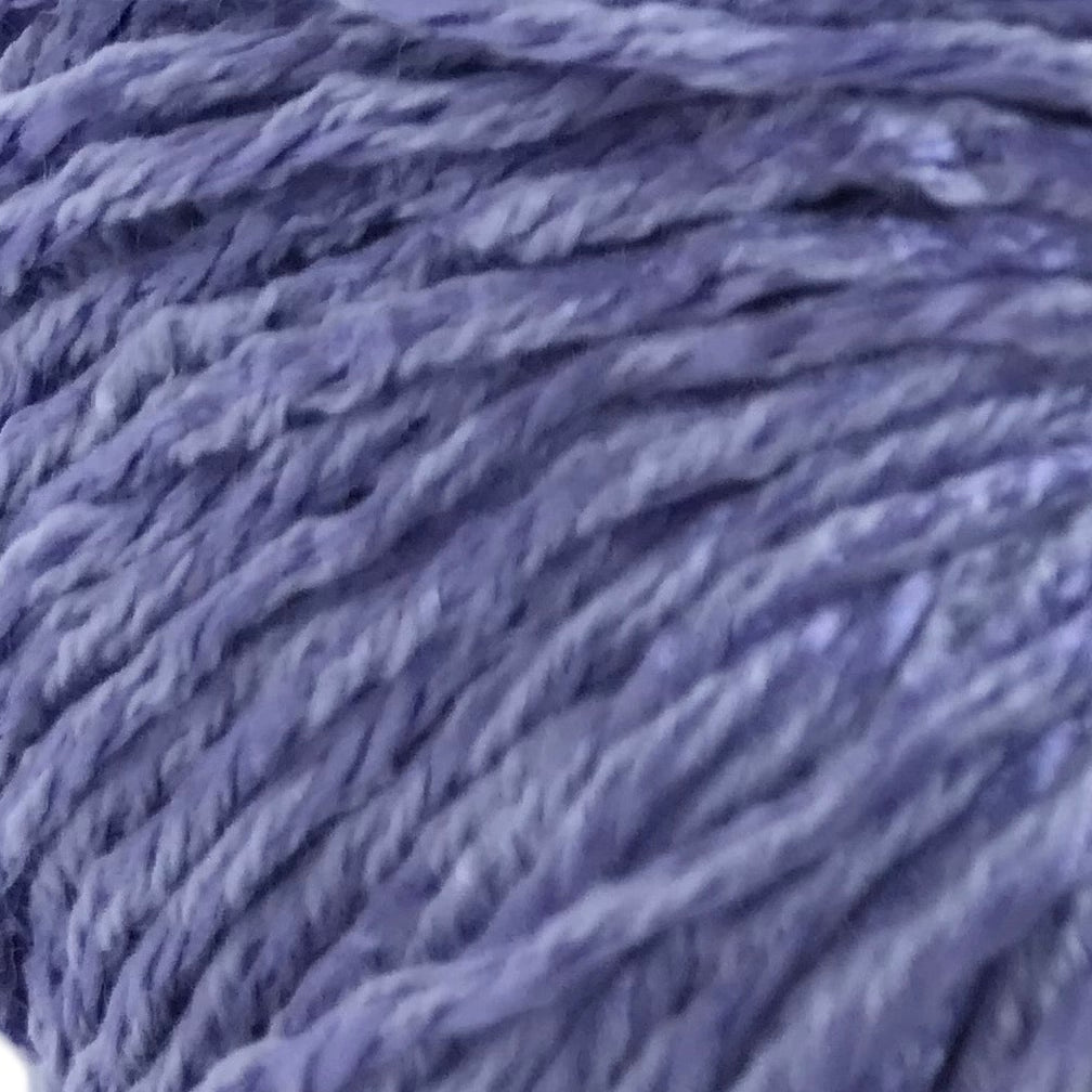 Close-up of a ball of purple yarn