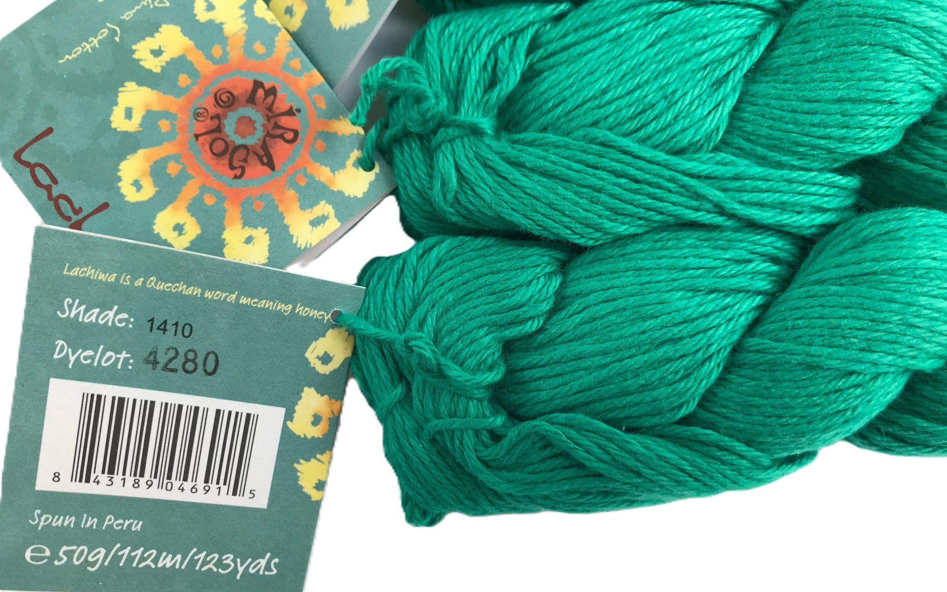 Green yarn skein with a label on a white background