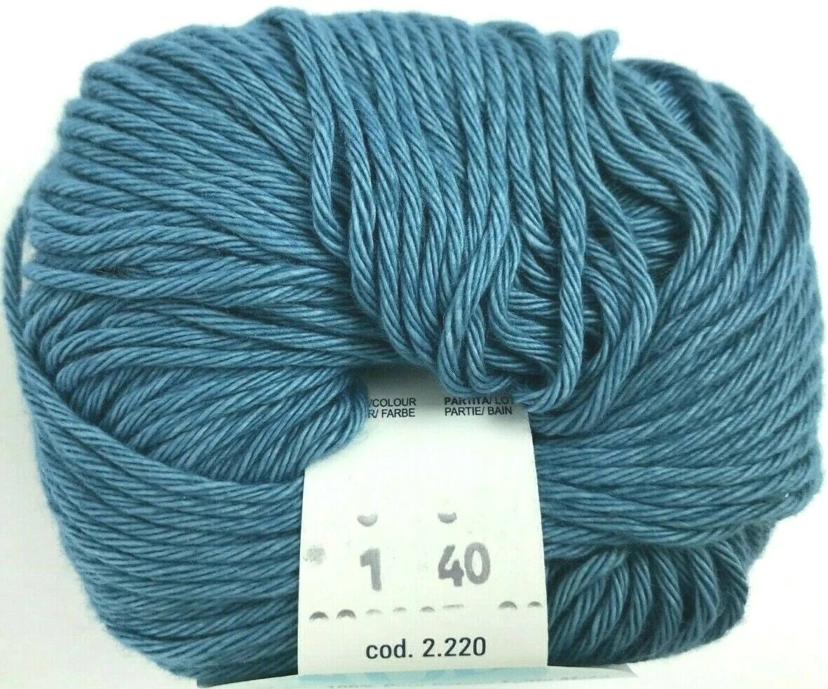Blue skein of yarn with a label on a white background