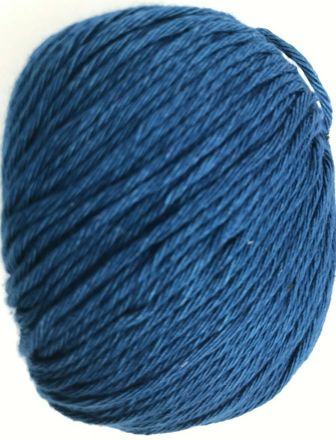 Blue yarn ball on a white background