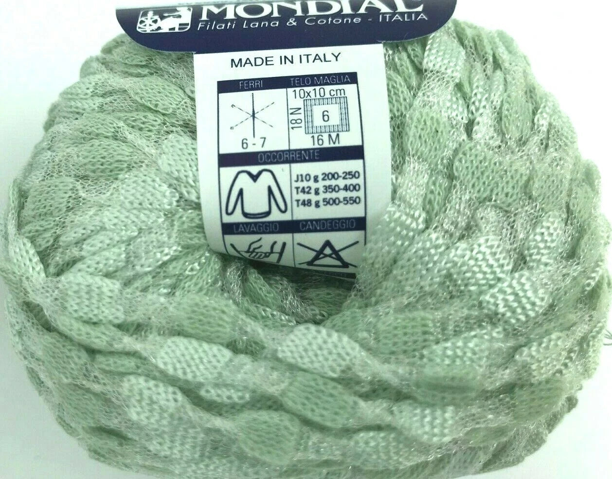 Ball of green yarn with a Mondial label on a white background